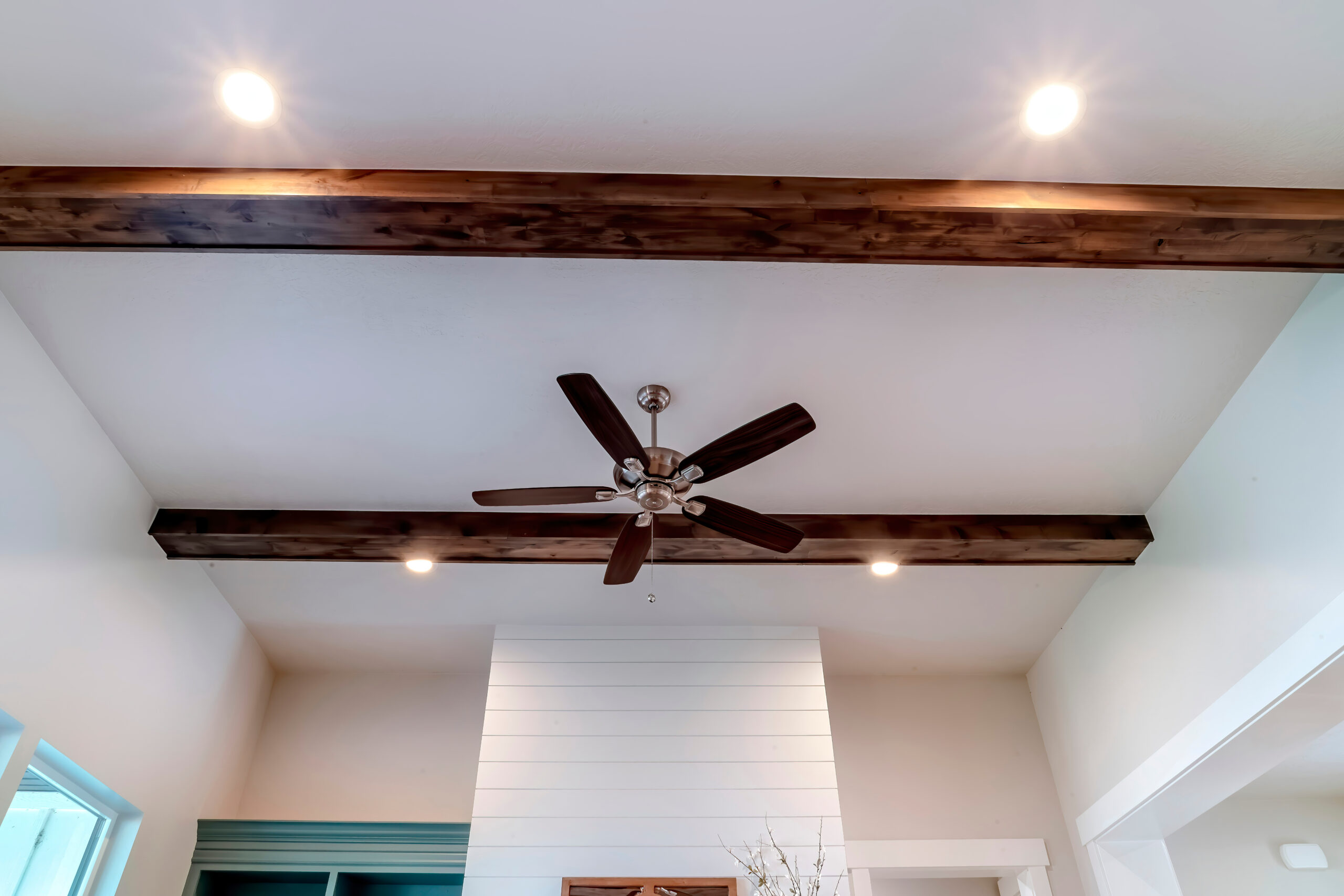 This is a picture for a blog about residential ceiling fan installation before the summer heat.